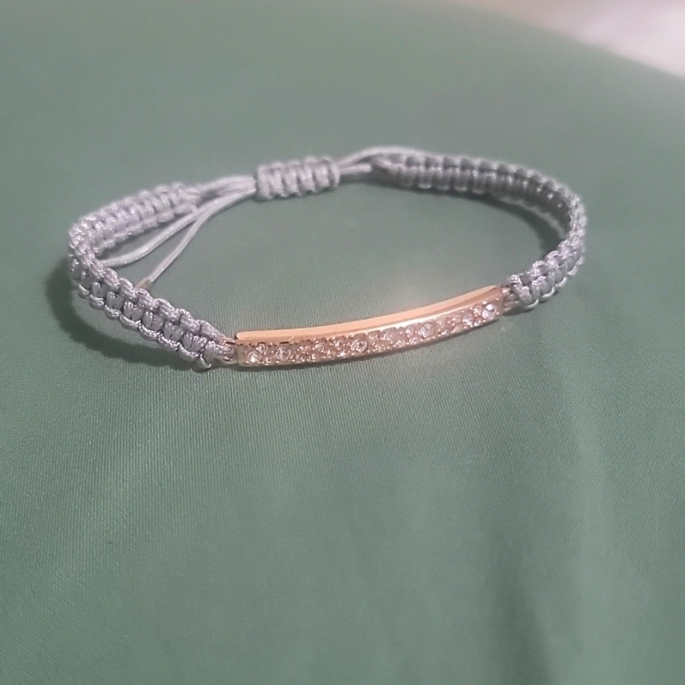 FOSSIL VINTAGE gold toned w / rhinestones and slider closure braided  bracelet